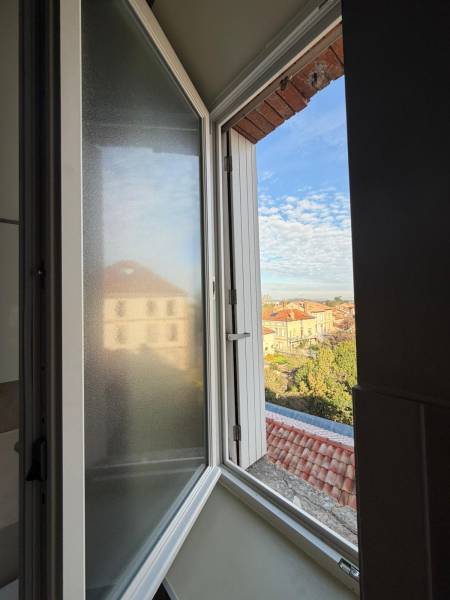 Pose de menuiseries en bois en centre-ville de Toulouse