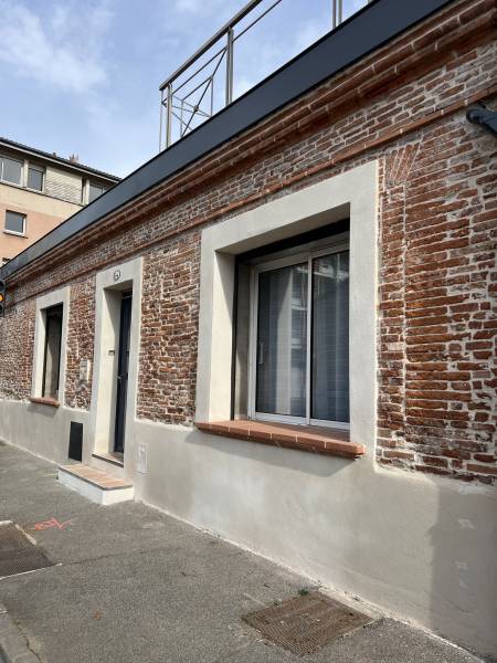 Restauration d’une façade en brique foraine - Toulouse (31)
